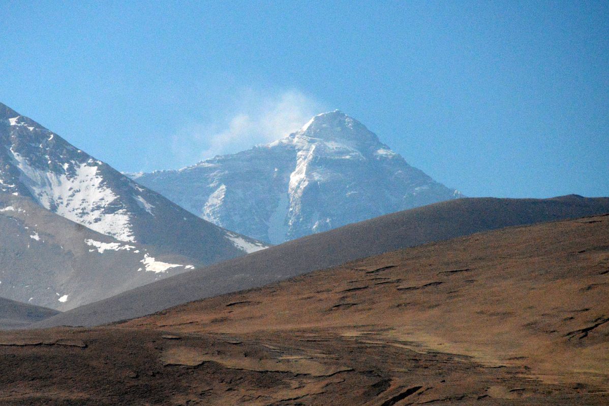 11 Mount Everest North Face Pokes Up Above The Hills From The Pass Between Tingri And Mount Everest North Base Camp In Tibet